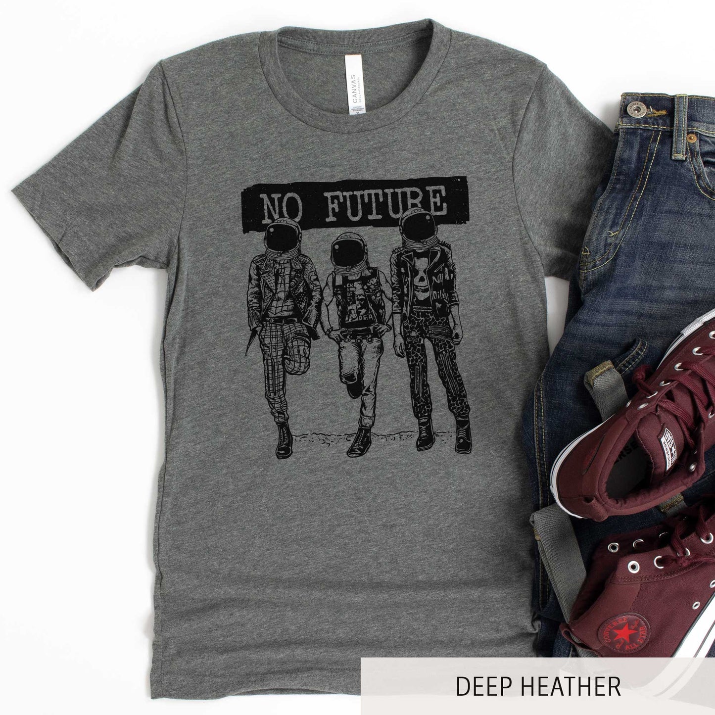 A deep heather Bella Canvas t-shirt featuring three punk dressed astronauts with the words no future above them.