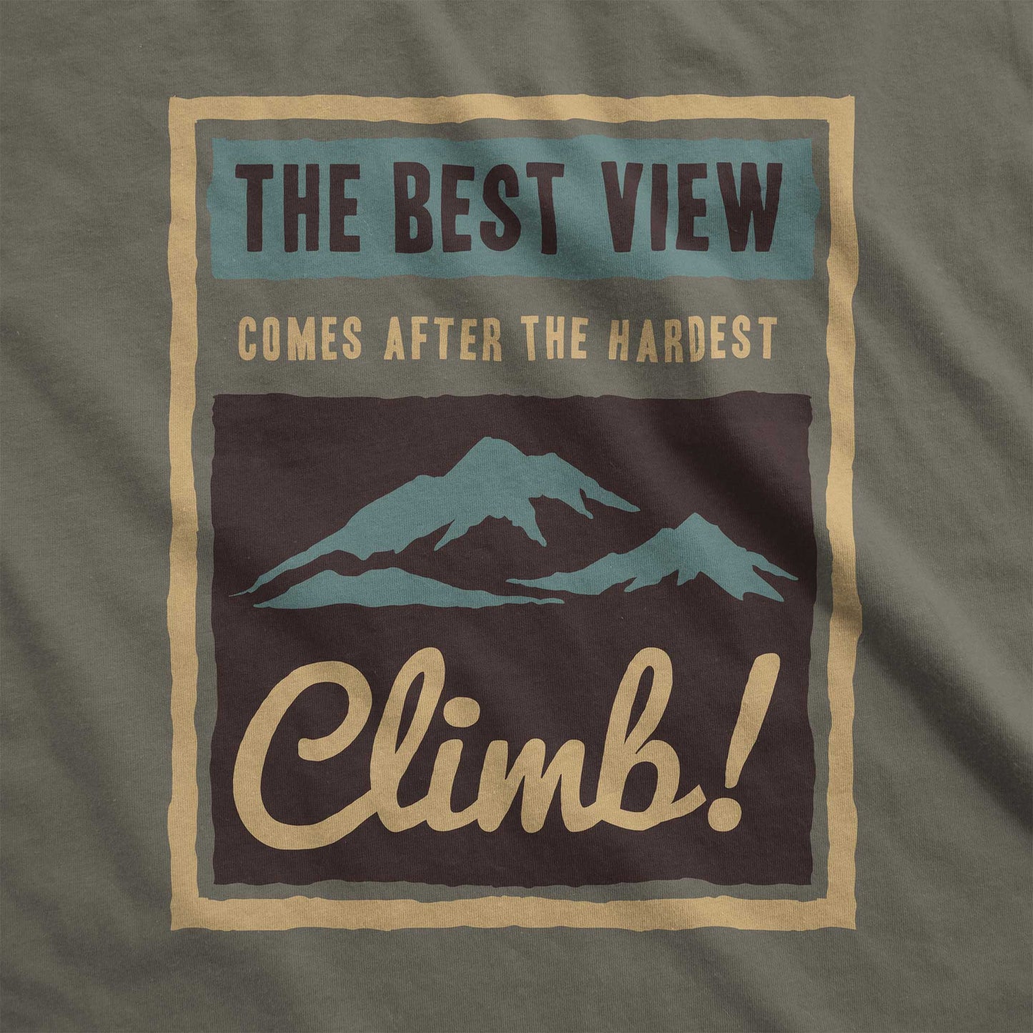 An army green Bella Canvas swatch that features mountains and the words the best view comes after the hardest climb.