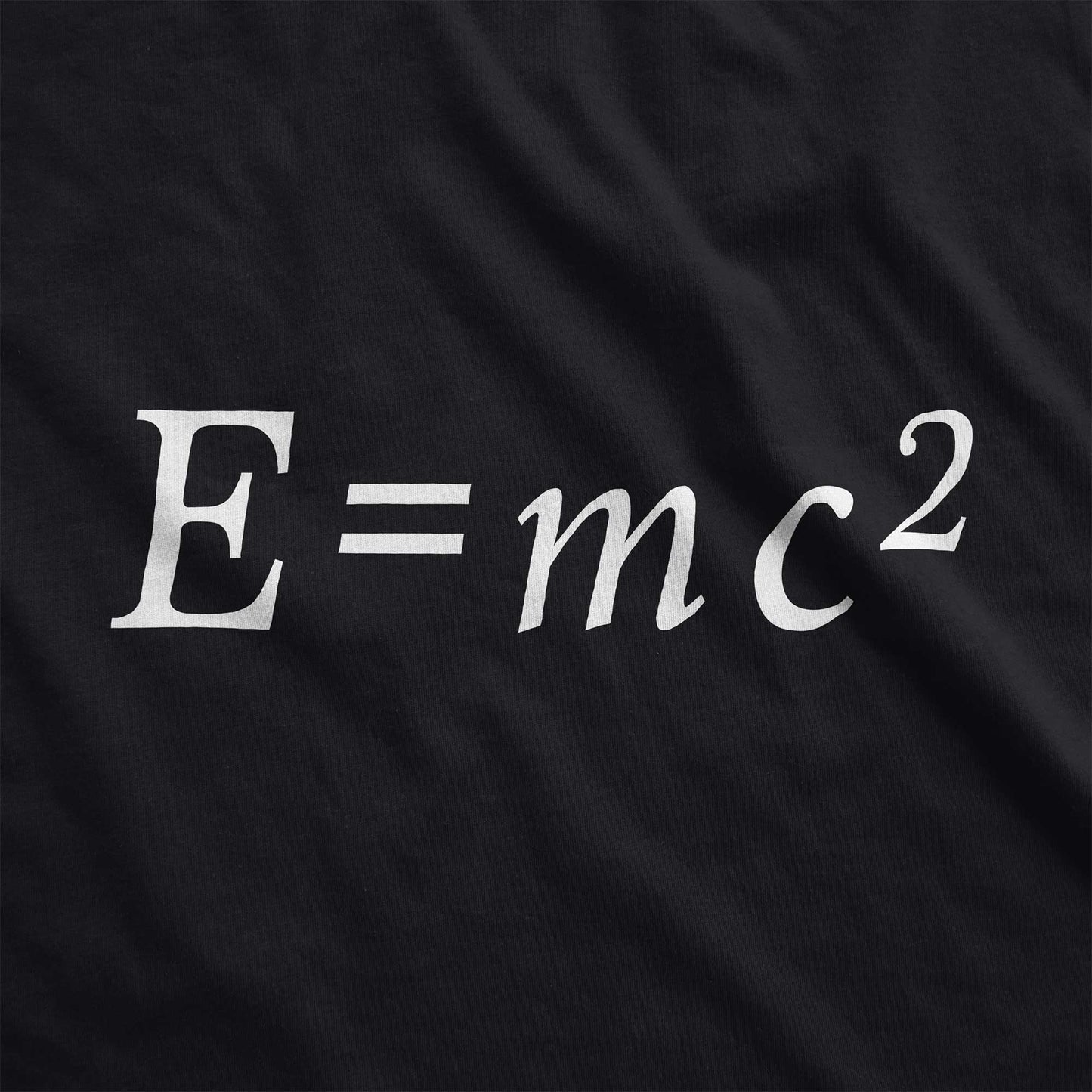A vintage black Bella Canvas swatch with Albert Einstein's famous equation e=mc2.