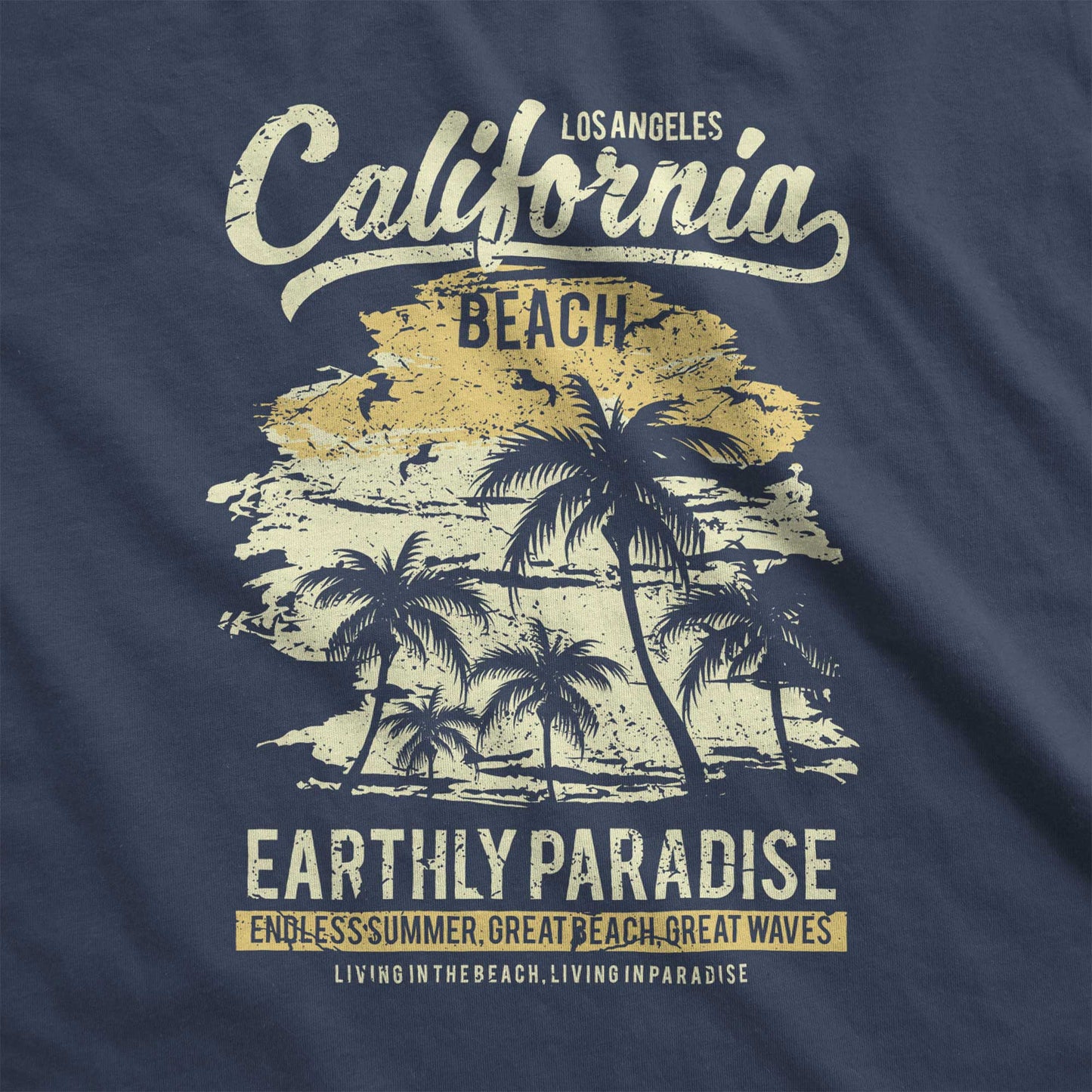 A navy Bella Canvas swatch featuring palm trees with words California beach earthly paradise.