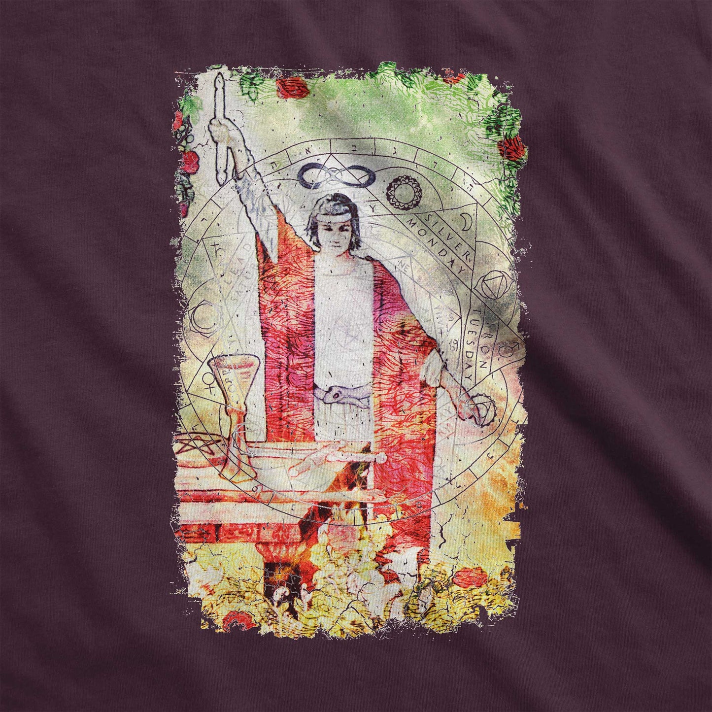 An oxblood black Bella Canvas swatch featuring the magician figure of the Rider-Waite tarot deck with a modern redesign.