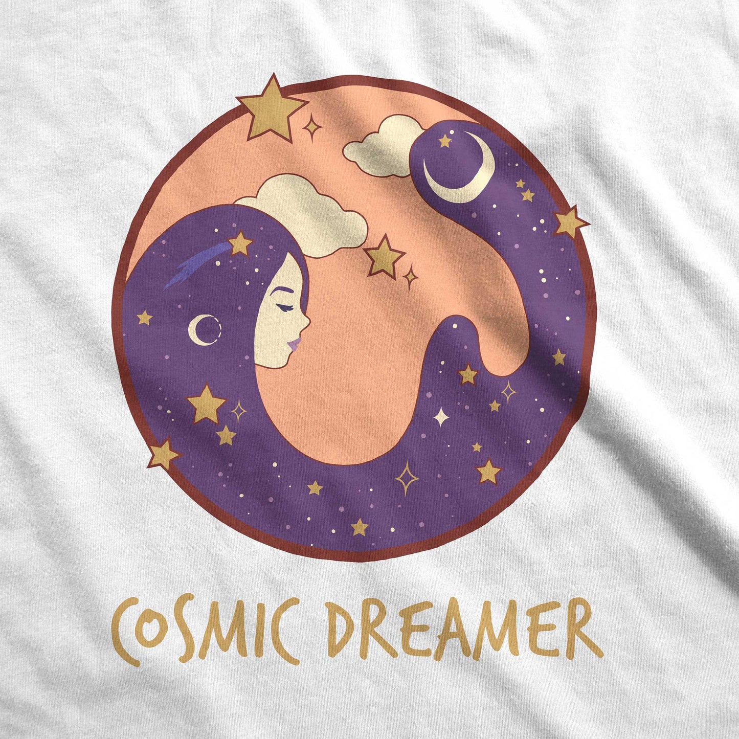 A white District 7501 swatch featuring a circle with a female face and hair that makes up the night sky and the words cosmic dreamer.