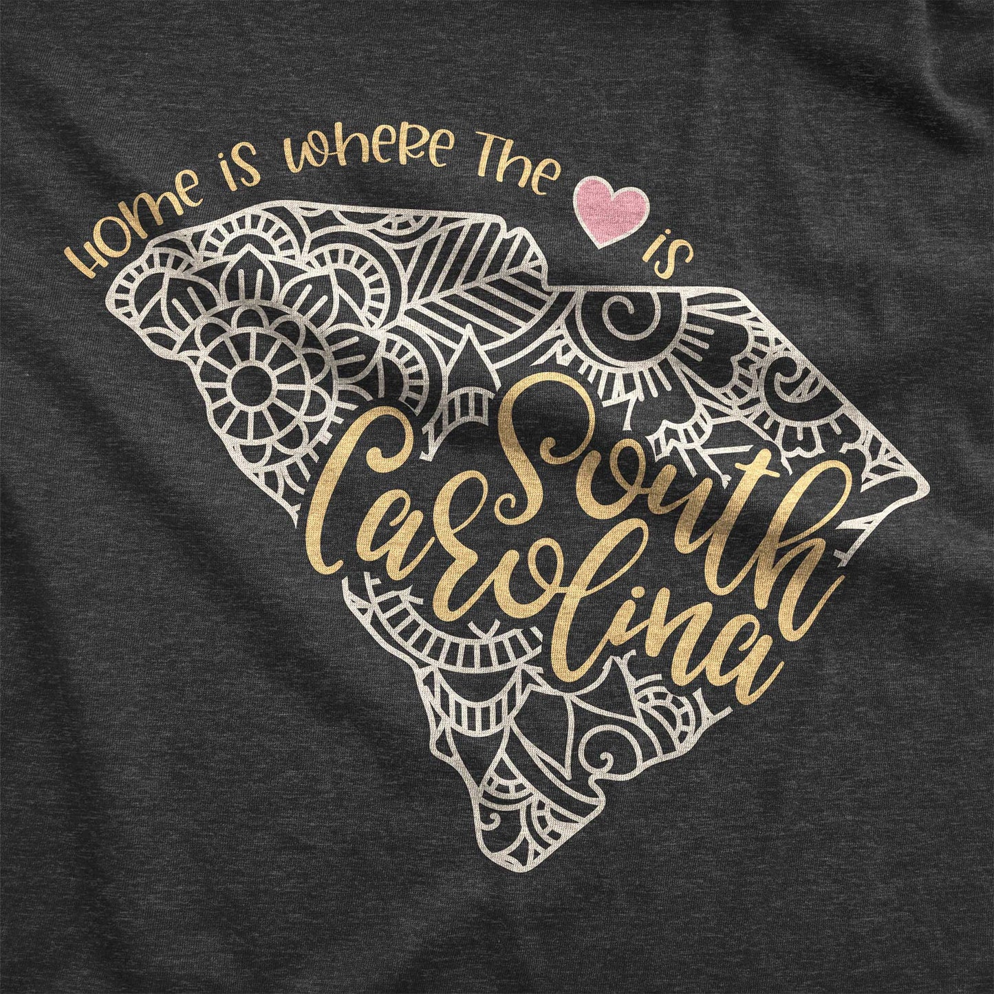 A dark grey heather Bella Canvas swatch featuring a mandala in the shape of South Carolina with the words home is where the heart is.