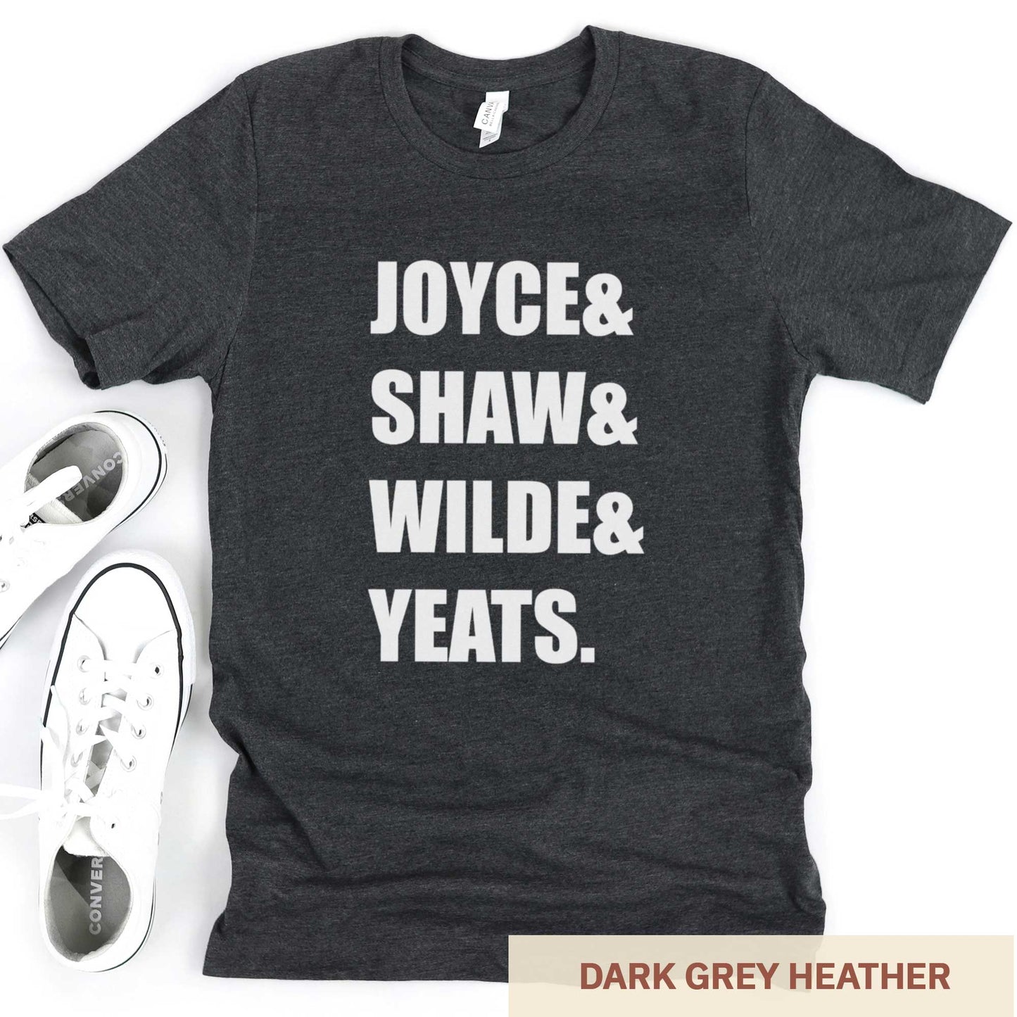 A dark grey heather Bella Canvas t-shirt featuring the last names of Irish writers Joyce, Shaw, Wilde and Yeats.