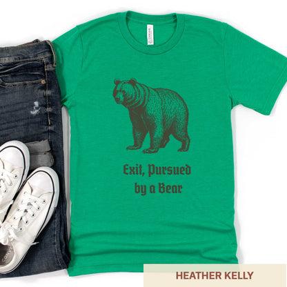 A heather kelly Bella Canvas t-shirt featuring a vintage looking bear with the words exit, pursued by a bear.