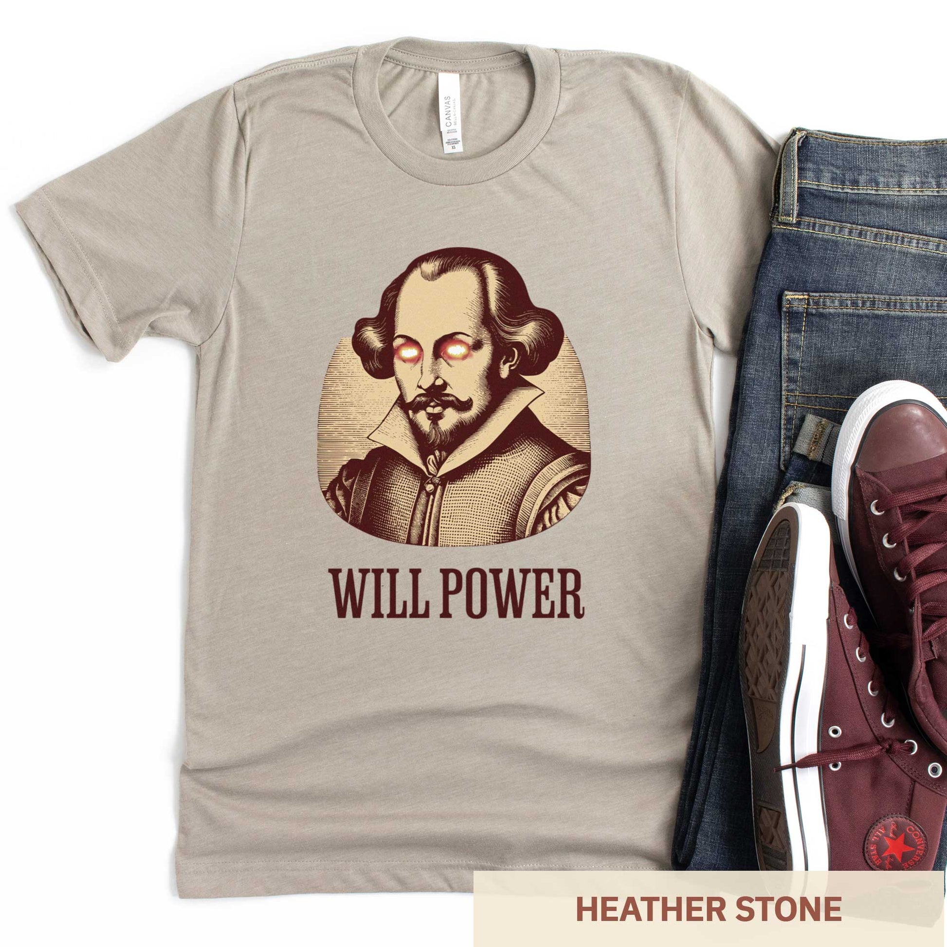 A heather stone Bella Canvas t-shirt featuring a woodcut of William Shakespeare with glowing superhero eyes and the words Will Power.