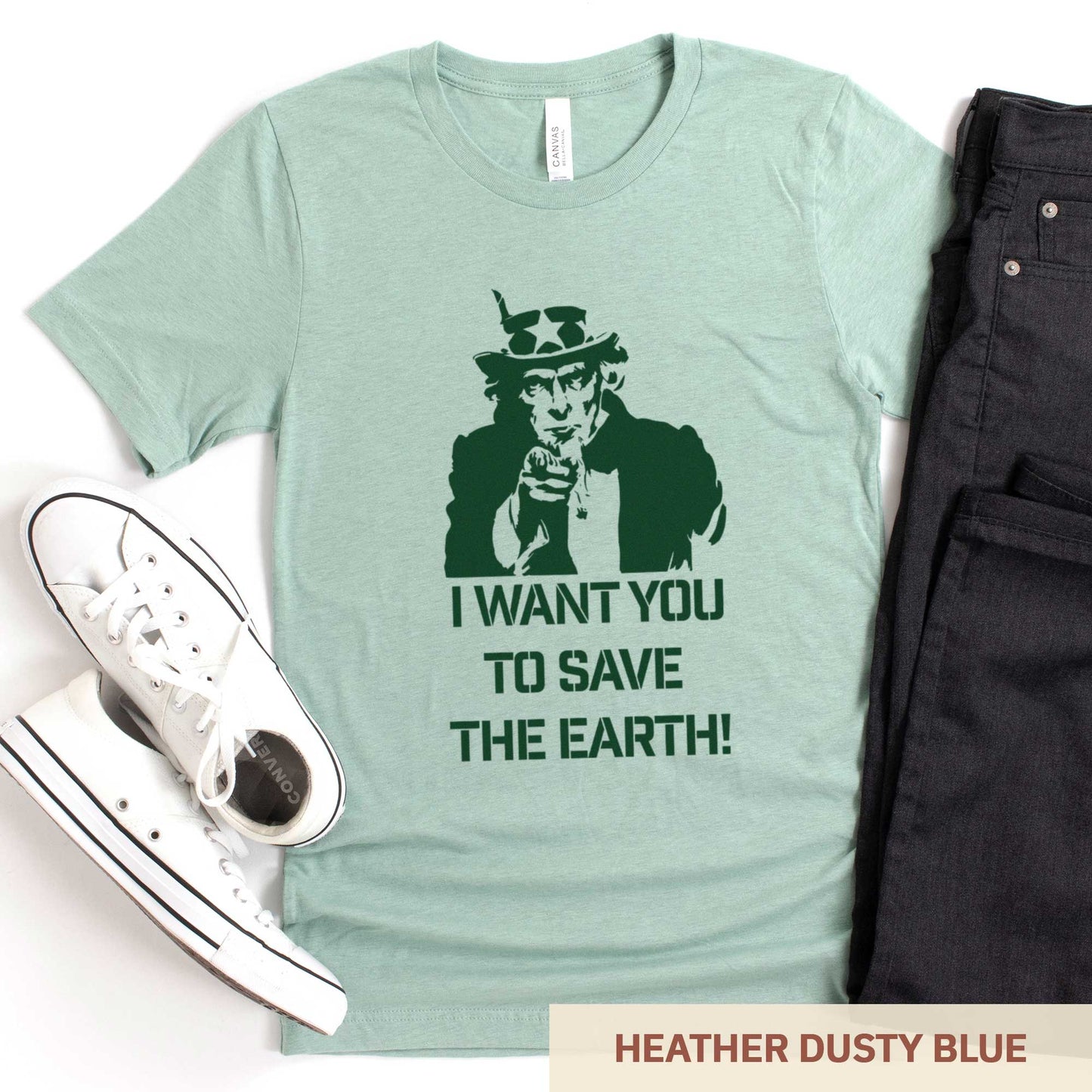 A heather dusty blue Bella Canvas t-shirt featuring Uncle Sam and the words I want you to save the Earth.