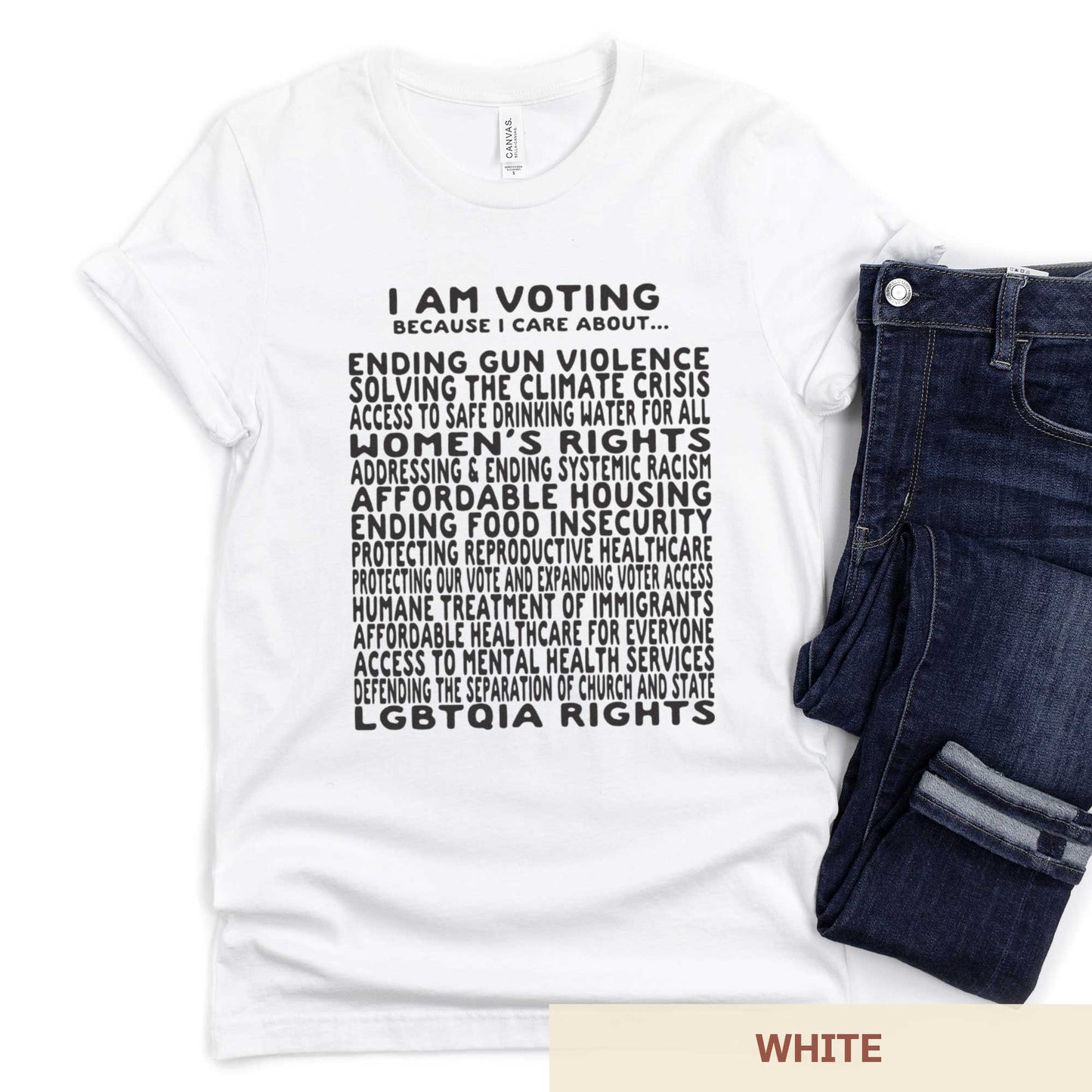 A white Bella Canvas t-shirt featuring a long list of issues to vote on.