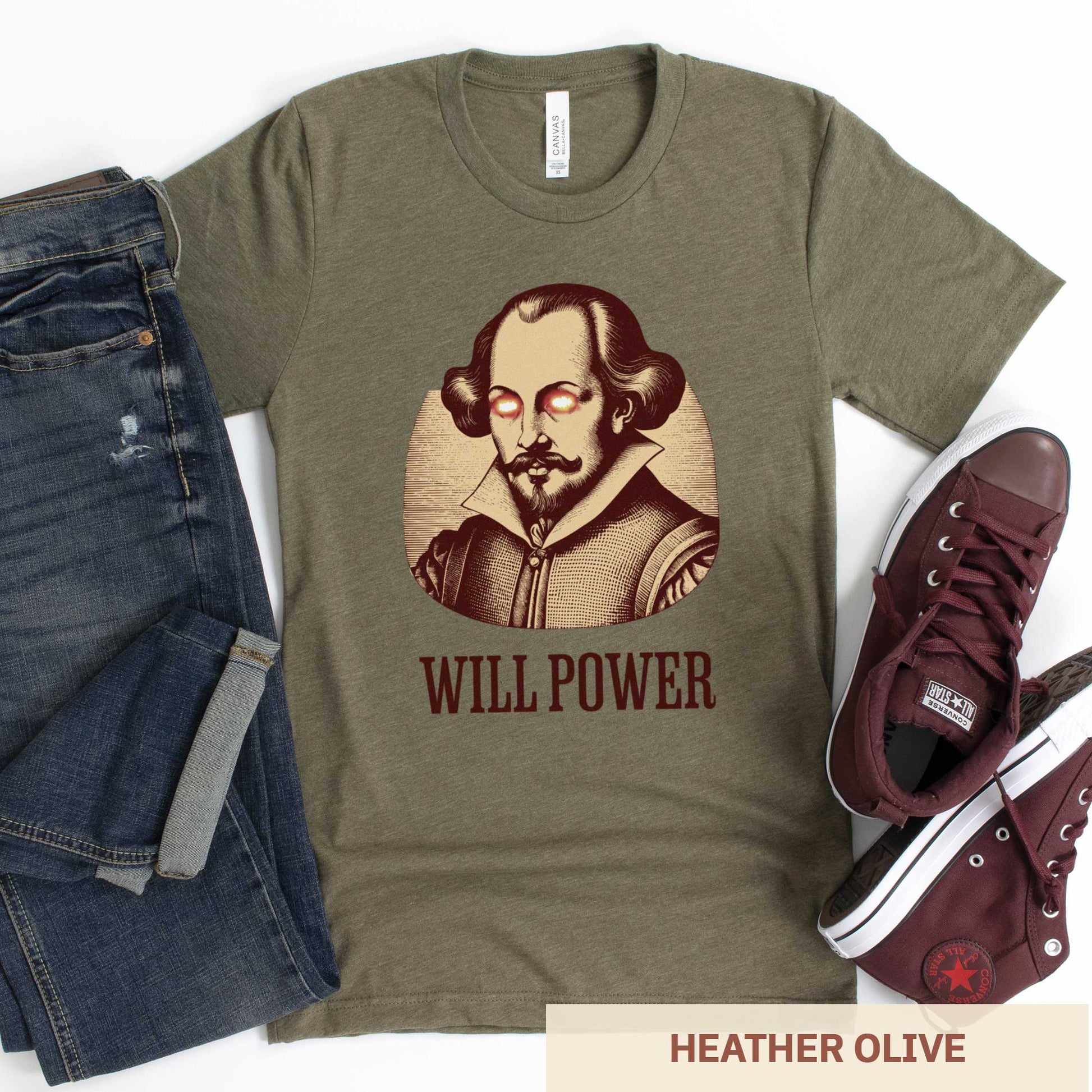 A heather olive Bella Canvas t-shirt featuring a woodcut of William Shakespeare with glowing superhero eyes and the words Will Power.