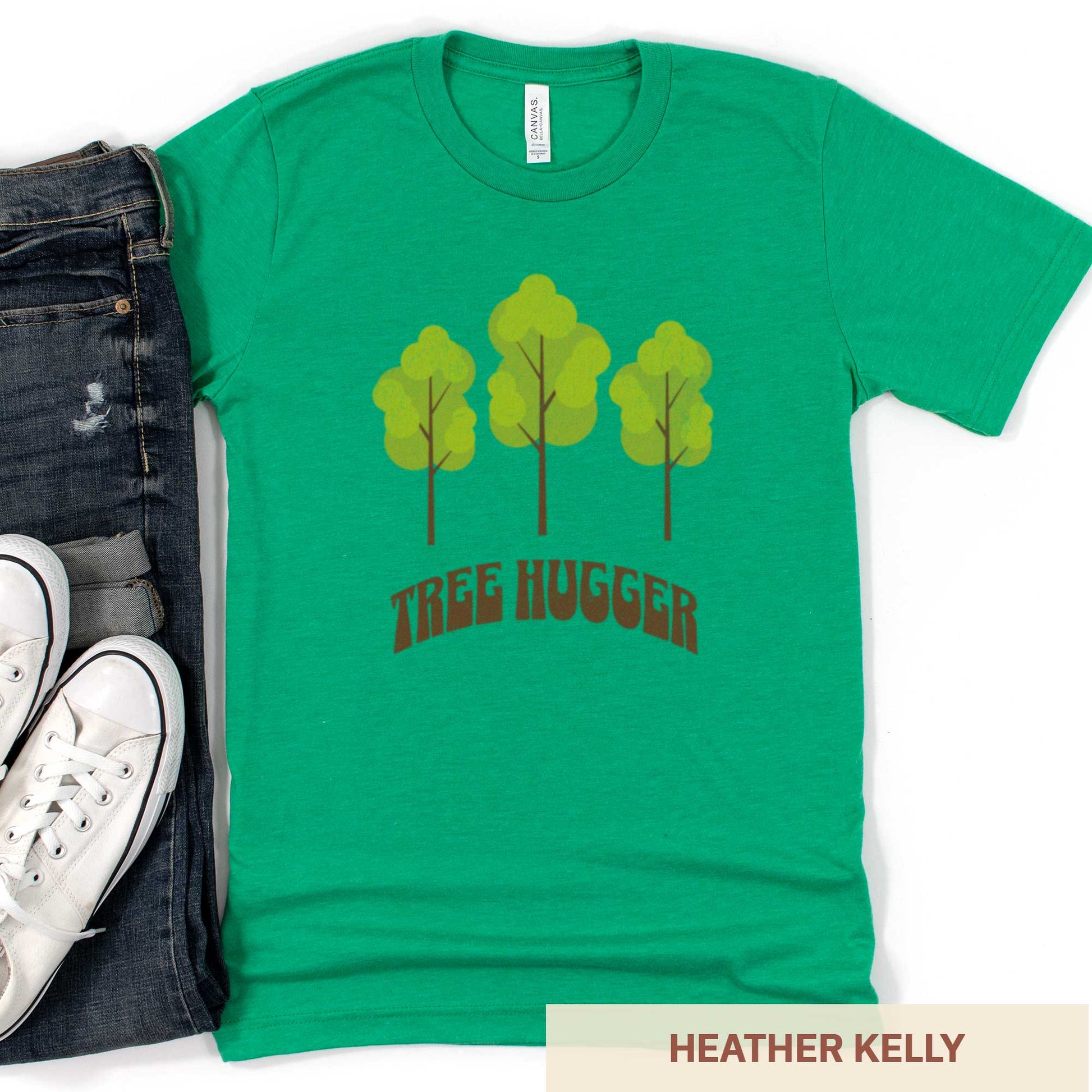 A heather kelly Bella Canvas t-shirt featuring three trees and the words tree hugger.