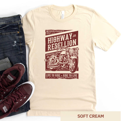A soft cream Bella Canvas t-shirt featuring a motorcycle and the words highway rebellion live to ride - ride to live.