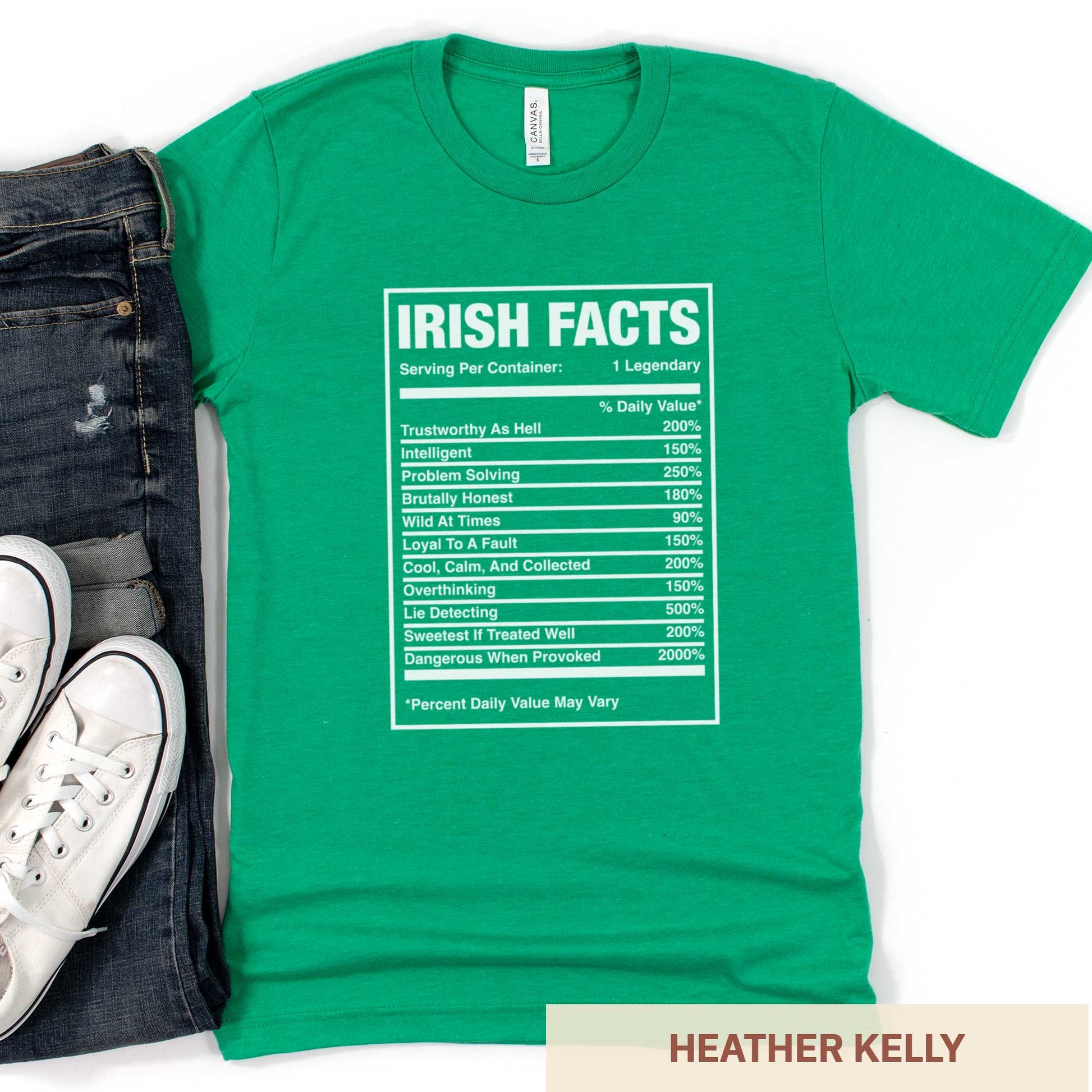 A heather kelly Bella Canvas t-shirt that features a nutrition facts chart of Irish characteristics.