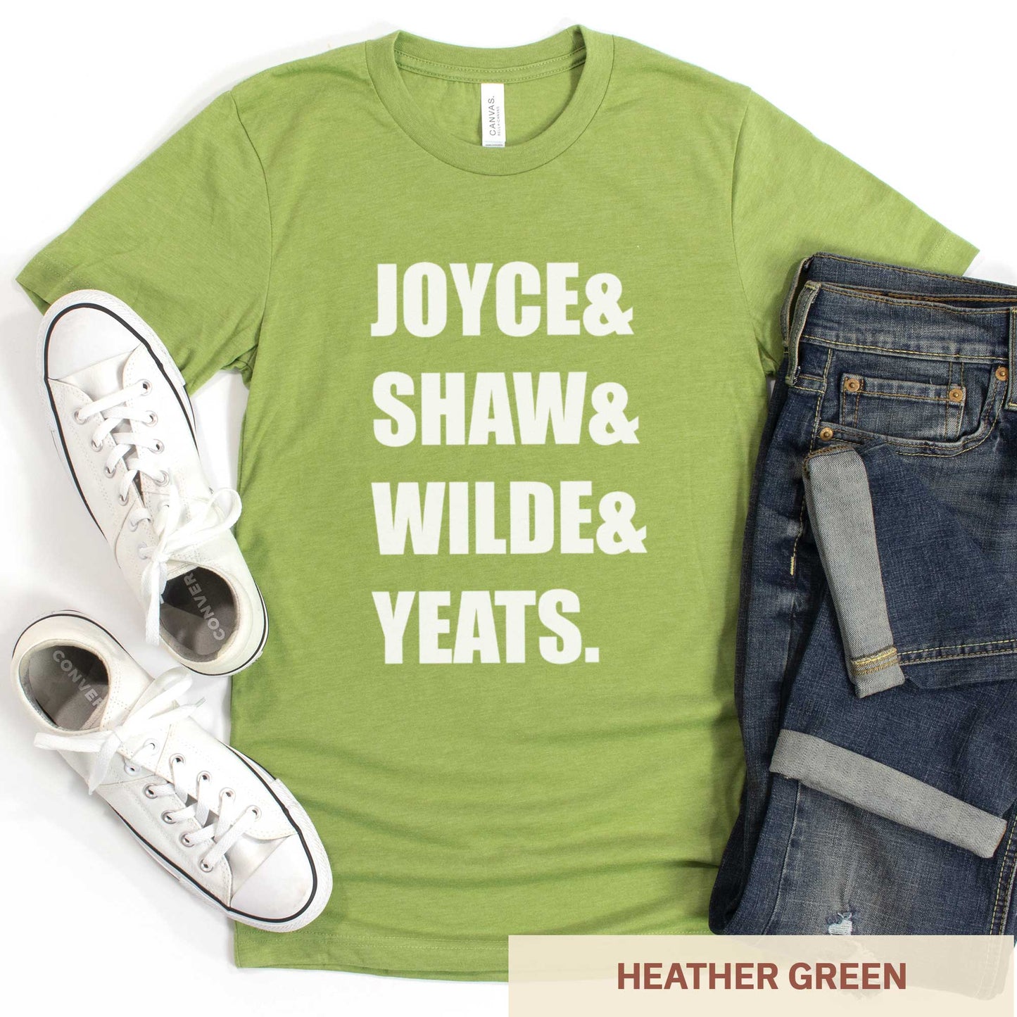 A heather green Bella Canvas t-shirt featuring the last names of Irish writers Joyce, Shaw, Wilde and Yeats.