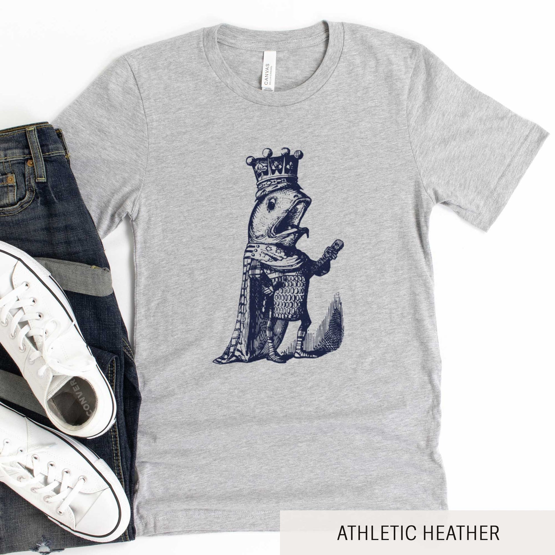 An athletic heather Bella Canvas t-shirt featuring a vintage illustration of a talking fish dressed in the royal robes of a king.