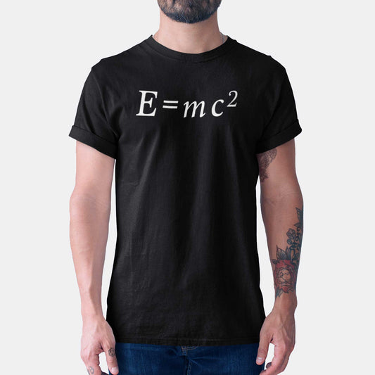 A man wearing a vintage black Bella Canvas t-shirt with Albert Einstein's famous equation e=mc2.