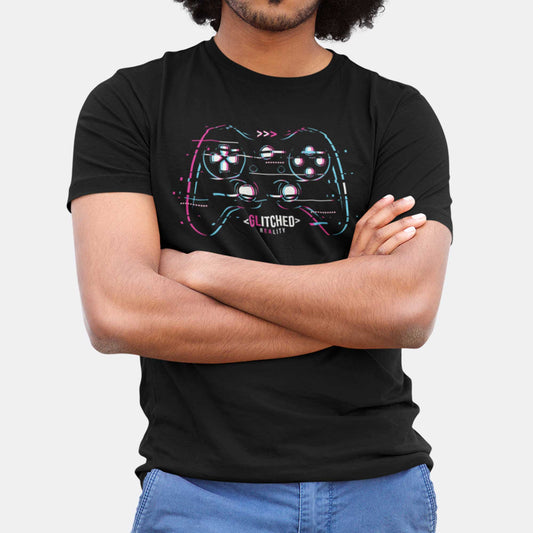 A black Bella Canvas t-shirt with a glitchcore video game controller with the words glitched reality.