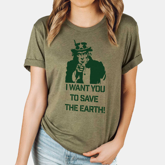 A woman wearing a heather olive Bella Canvas t-shirt featuring Uncle Sam and the words I want you to save the Earth.