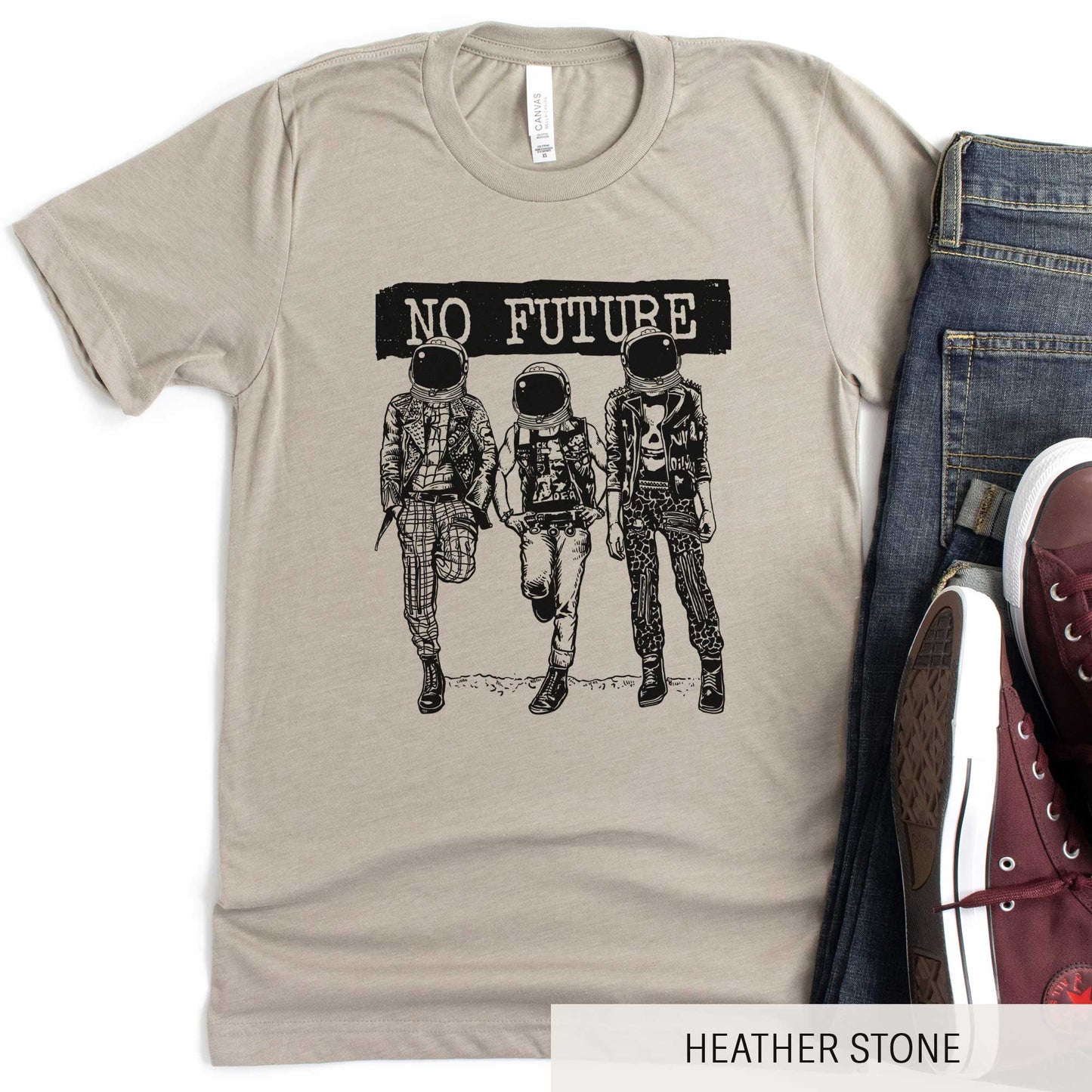 A heather stone Bella Canvas t-shirt featuring three punk dressed astronauts with the words no future above them.