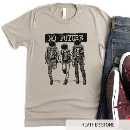 A heather stone Bella Canvas t-shirt featuring three punk dressed astronauts with the words no future above them.