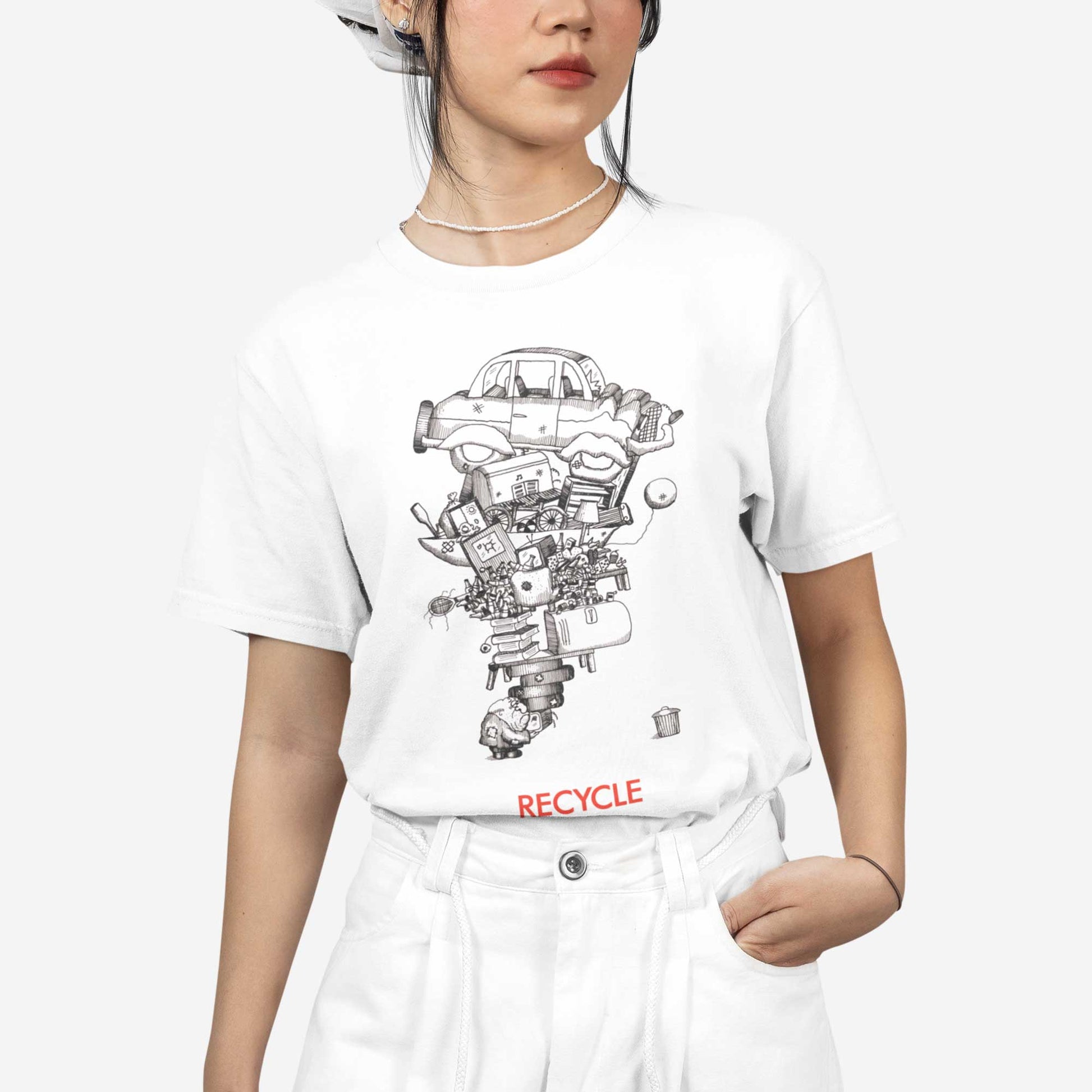 A woman wearing a white Bella Canvas t-shirt featuring a vintage 70's cartoon of a man recycling junk.