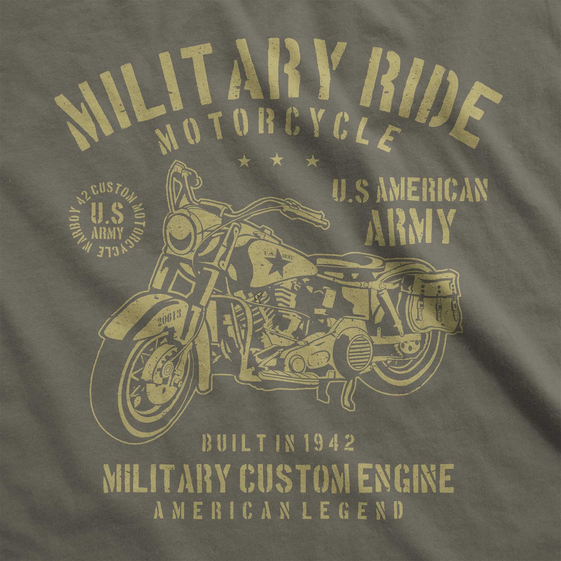 An army green Bella Canvas swatch featuring a vintage American army motorcycle and the words military ride motorcycle.