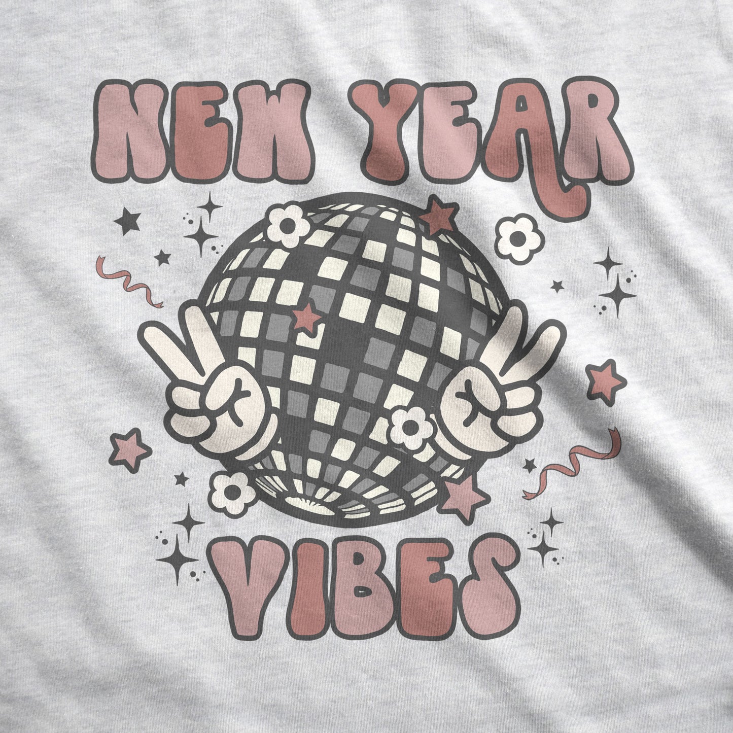 An ash Bella Canvas swatch featuring a retro disco ball holding up hands in a peace sign that says New Year vibes.