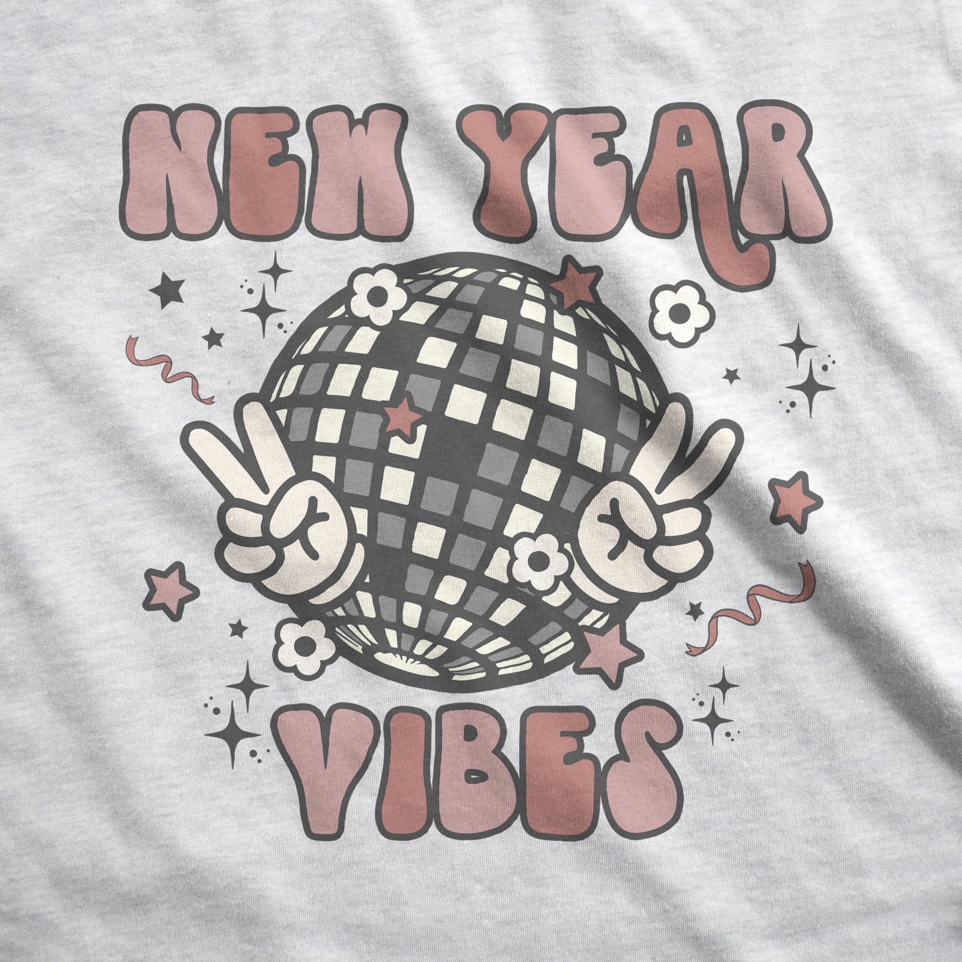 An ash Bella Canvas swatch featuring a retro disco ball holding up hands in a peace sign that says New Year vibes.