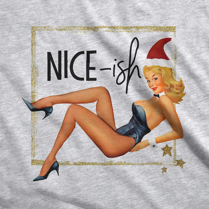An athletic heather Bella Canvas swatch that features a 50's retro pin-up of a woman in a sexy outfit and stockings with a santa hat and the words nice-ish.