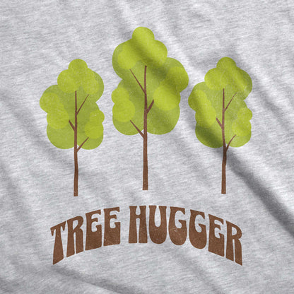 An athletic heather Bella Canvas swatch featuring three trees and the words tree hugger.