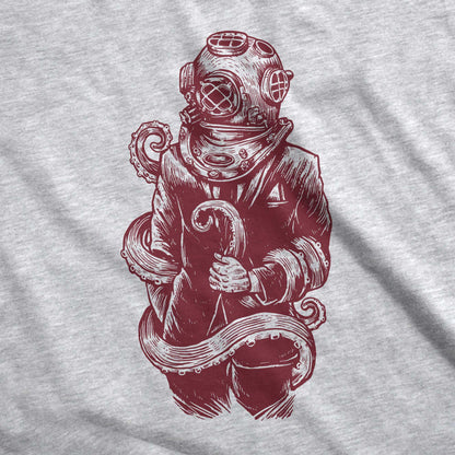 An athletic heather Bella Canvas swatch featuring a figure in a business suit wearing a vintage diver's helmet with octopus tentacles wrapped around them.