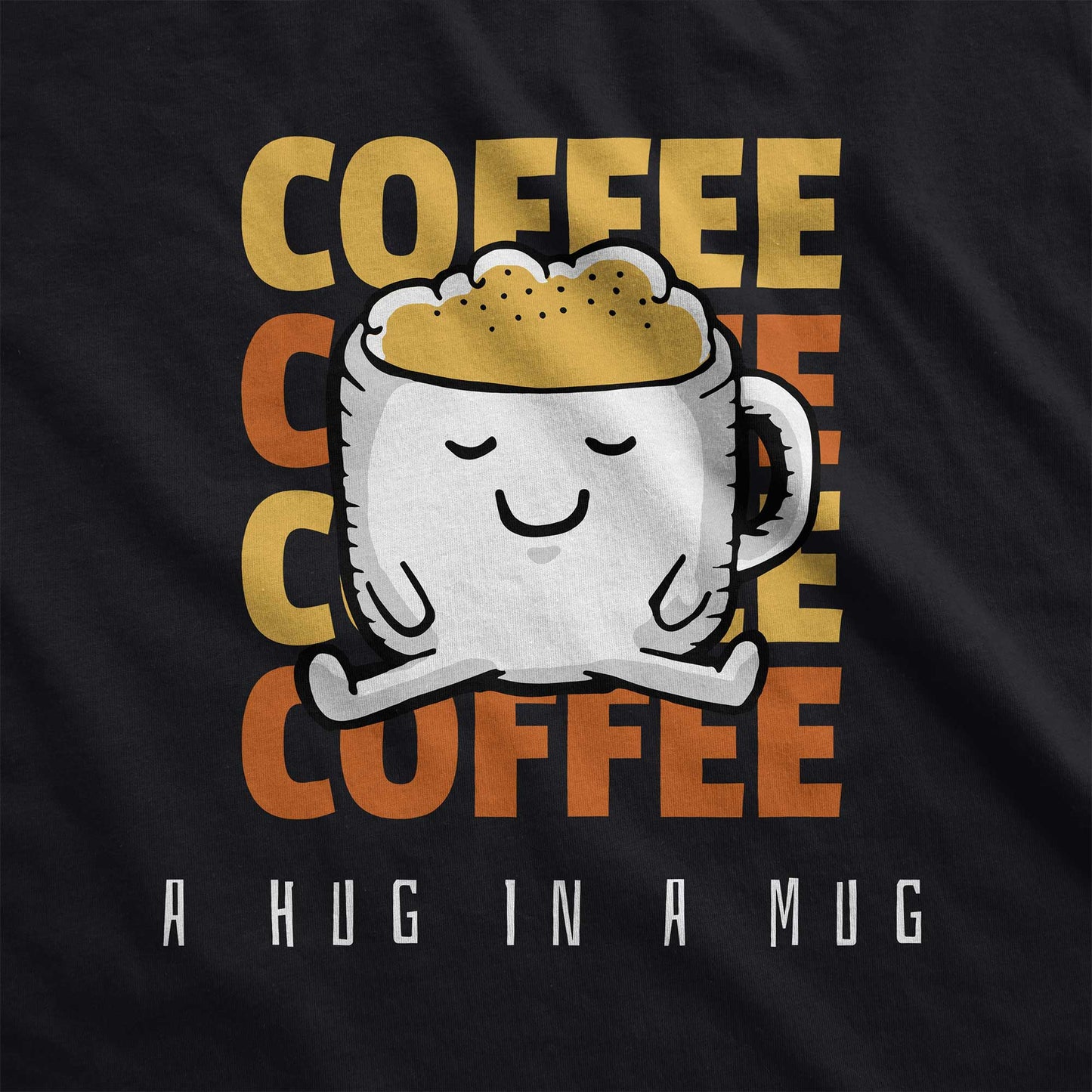 A black Bella Canvas t-shirt featuring a cartoon mug full of coffee and the words coffee a hug in a mug.
