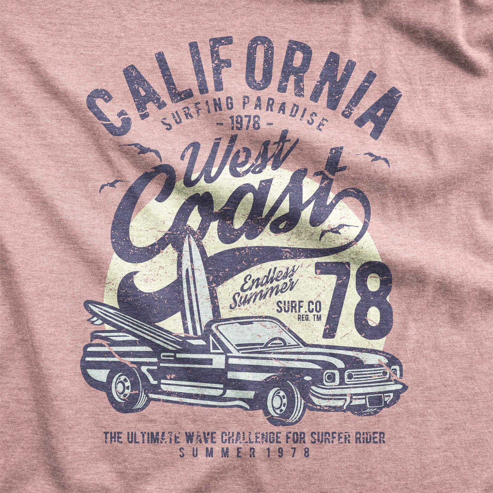 A desert pink Next Level swatch featuring a vintage convertible car with a surfboard and sunset and the words california west coast.