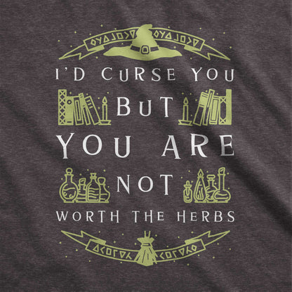 A dark grey heather Bella Canvas swatch with a witch's hat, books and potions and the words I'd curse you but you are not worth the herbs.