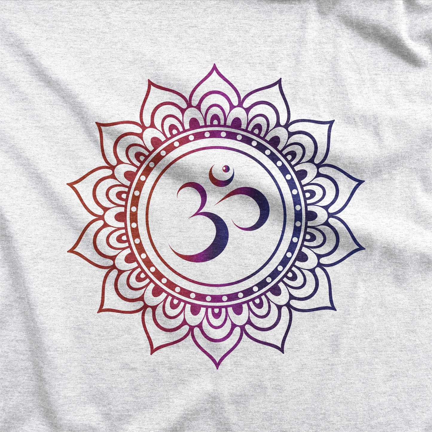 A heather white Next Level swatch featuring an om symbol surrounded by a mandala.