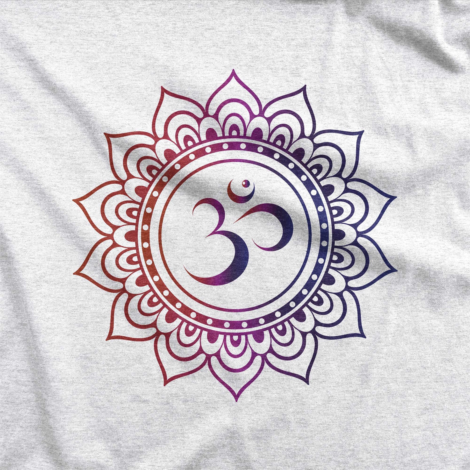 A heather white Next Level swatch featuring an om symbol surrounded by a mandala.