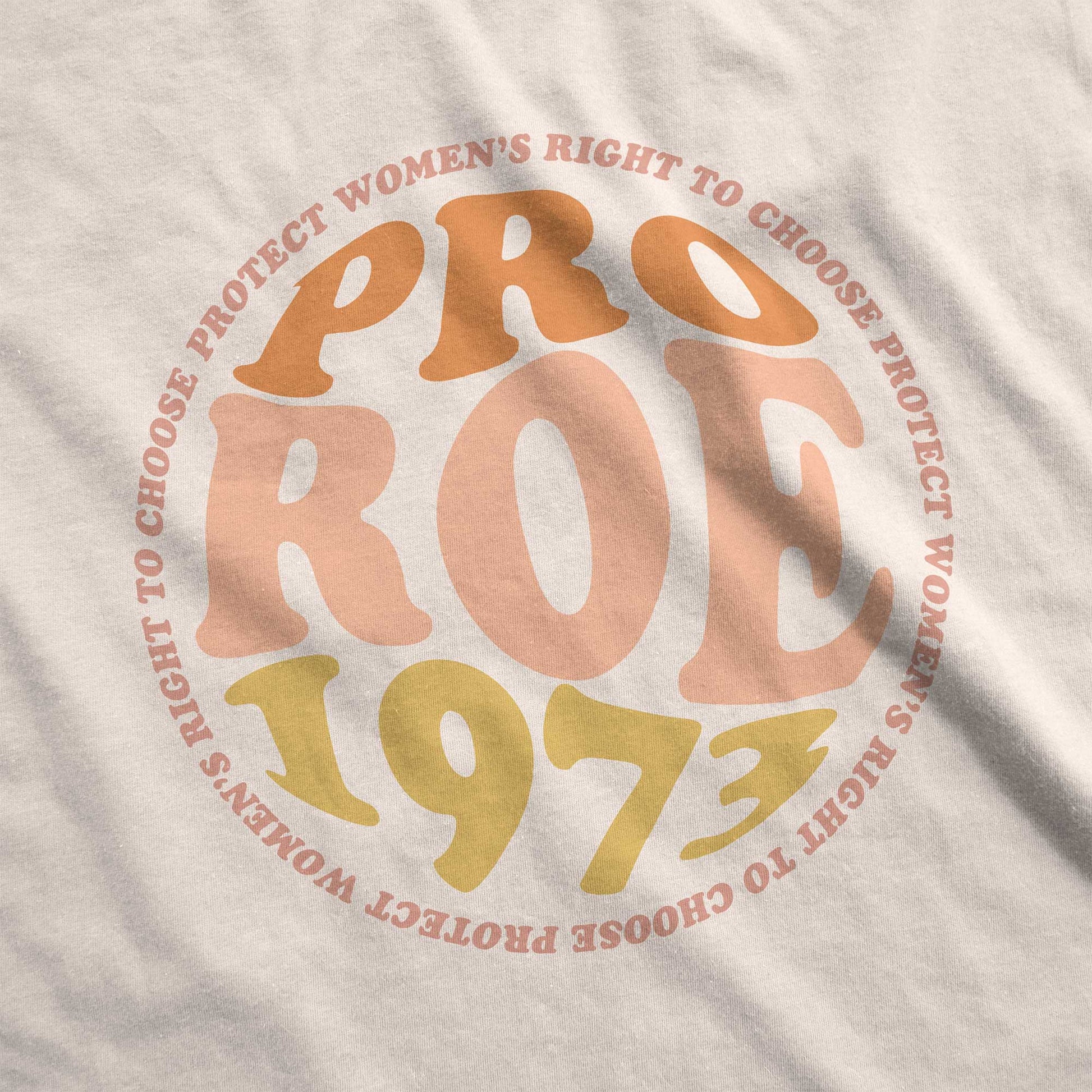 A soft cream Bella Canvas swatch featuring the words pro roe 1973 in retro font.