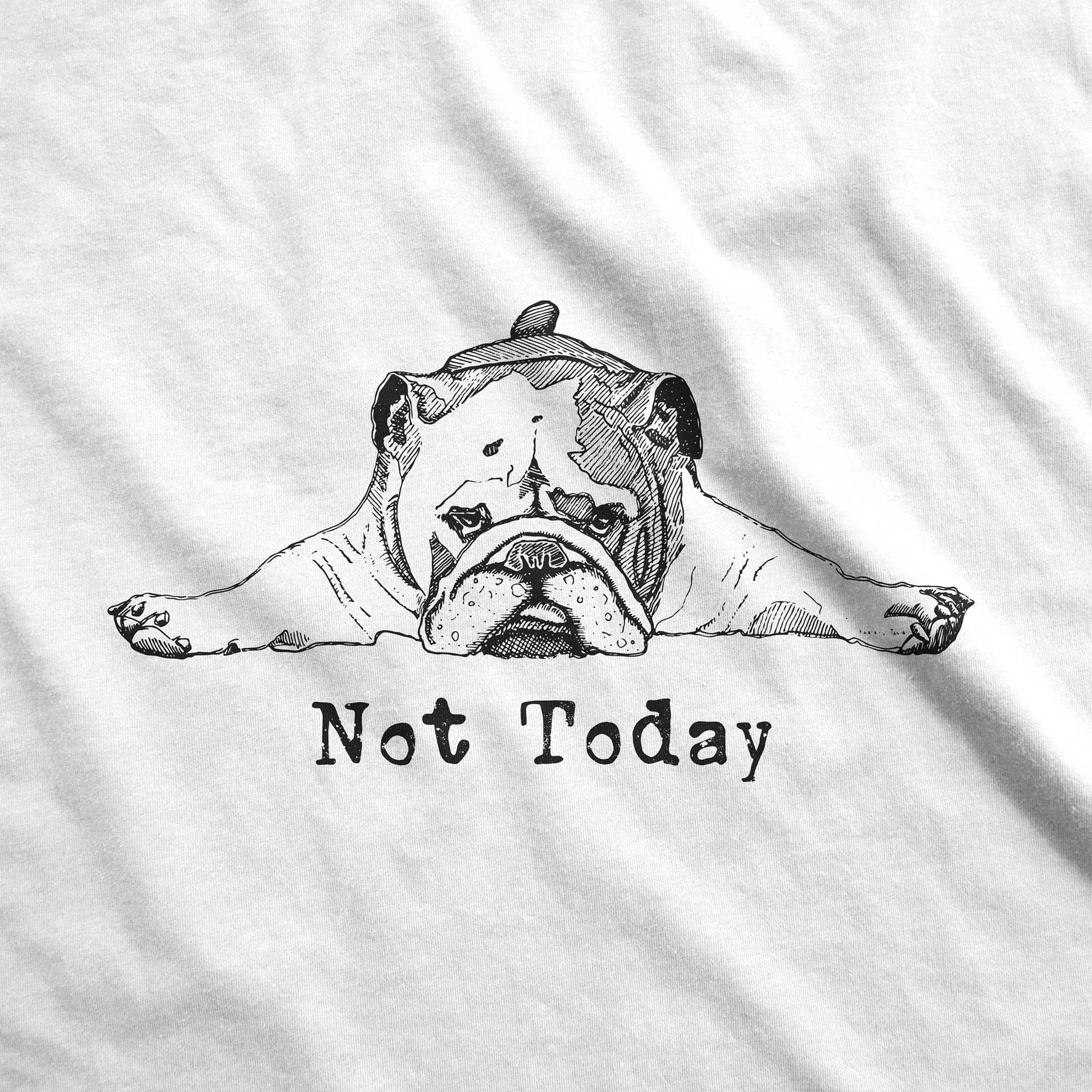 A white fabric swatch featuring a tired bulldog with the words not today.