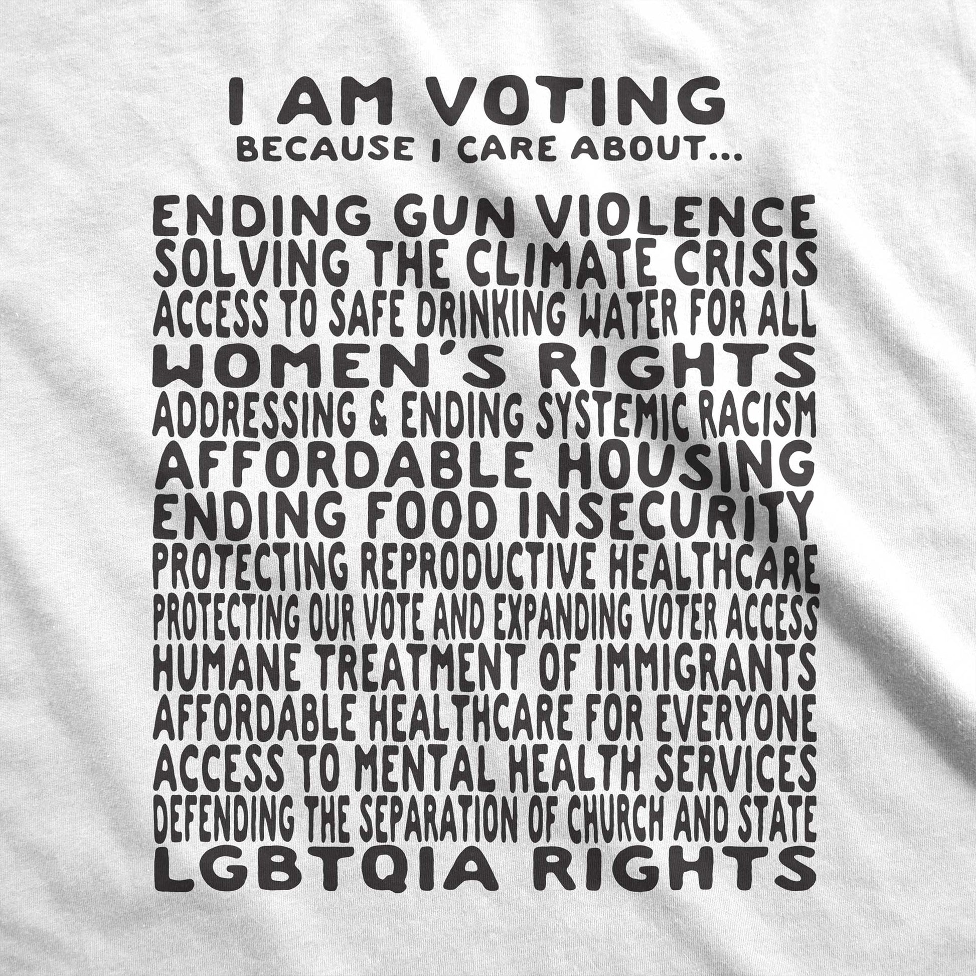 A white Bella Canvas swatch featuring a long list of issues to vote on.