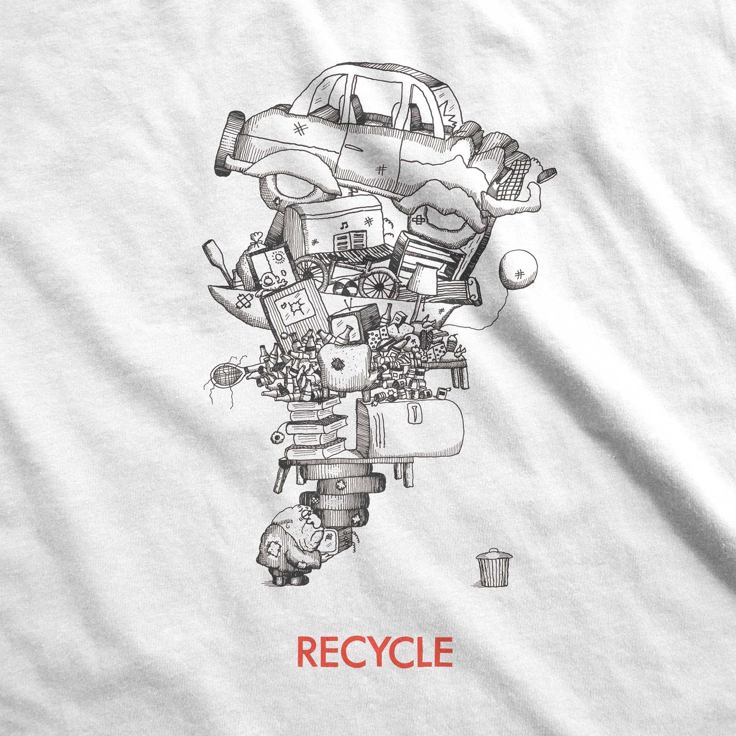 A white Bella Canvas swatch featuring a vintage 70's cartoon of a man recycling junk.