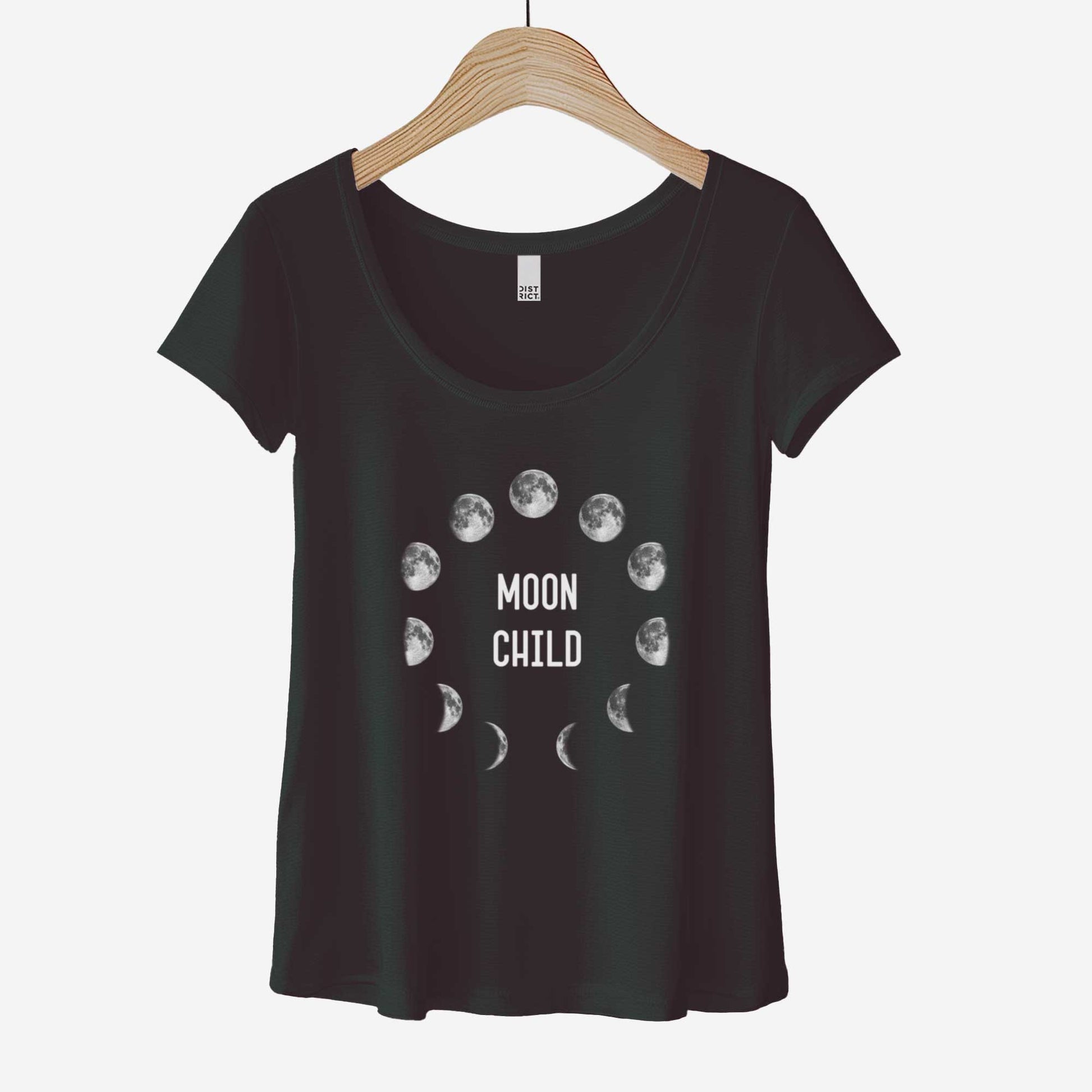 A black District 7501 scoop neck t-shirt with the phases of the moon in a circle and the words moon child in the center.