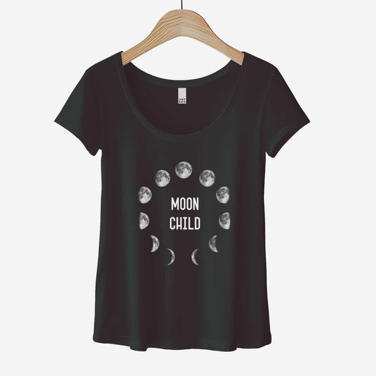 A black District 7501 scoop neck t-shirt with the phases of the moon in a circle and the words moon child in the center.