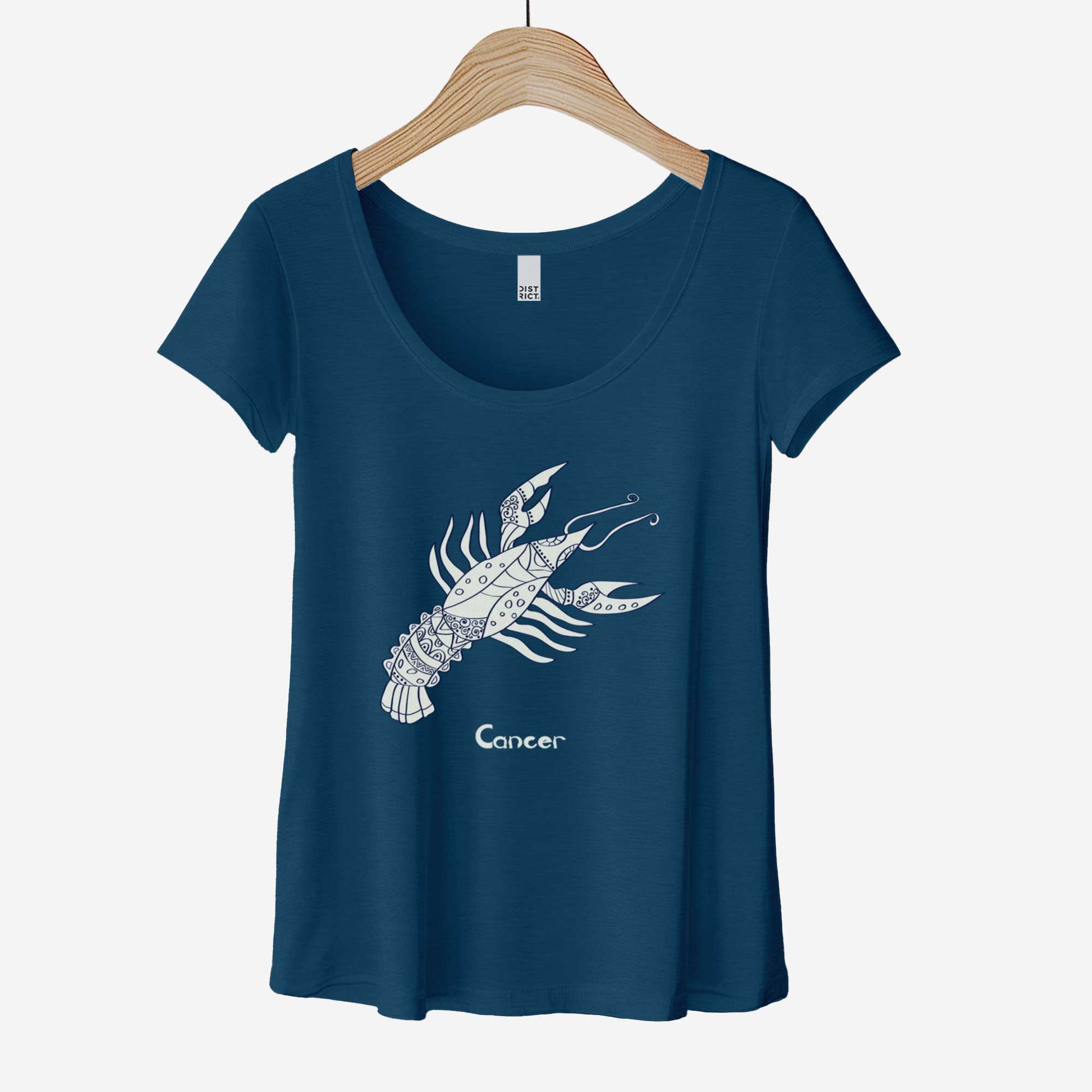 A hanging heathered neptune District 7501 scoop neck t-shirt featuring the zodiac symbol of Cancer, the crayfish, in a Mediterranean style illustration.