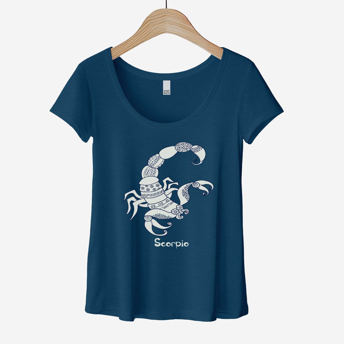 A hanging heathered neptune District 7501 scoop neck t-shirt featuring the zodiac symbol of Scorpio, the scorpion, in a Mediterranean style.