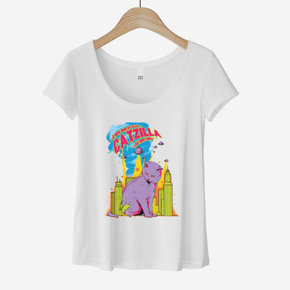 A hanging white District 7501 scoop neck t-shirt featuring a pop art neon version of a 50 story cat sitting among the skyscrapers of a major city.