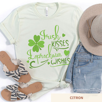 A citron Bella Canvas t-shirt with a shamrock and the words irish kisses leprachaun wishes