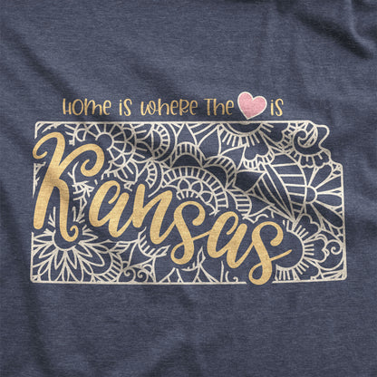 A heather navy Bella Canvas swatch featuring a mandala in the shape of Kansas with the words home is where the heart is.